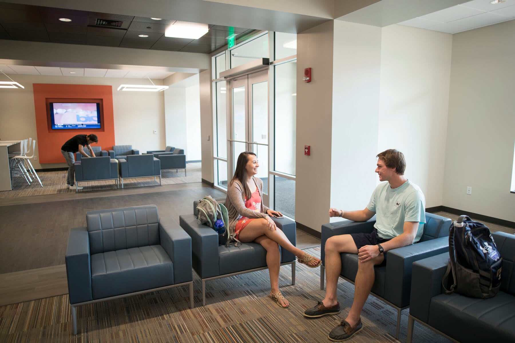 Students talking together in Crowe Hall